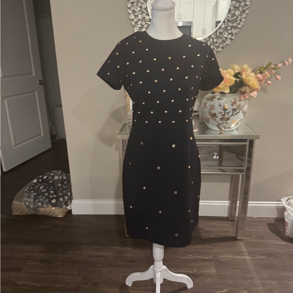 Elegant Black Dress with Gold Accents